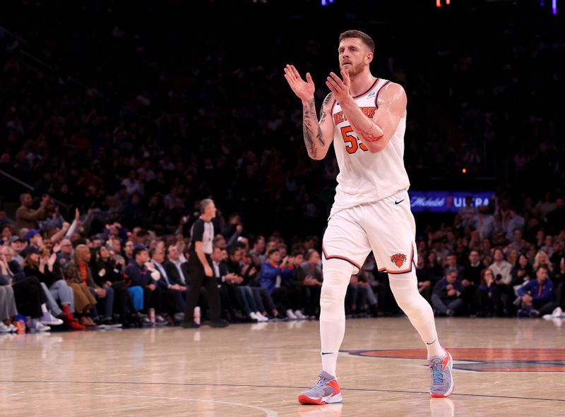 NEW YORK, NEW YORK - JANUARY 03: Isaiah Hartenstein #55 of the New York Knicks celebrates during the second half against the Chicago Bulls at Madison Square Garden on January 03, 2024 in New York City. The New York Knicks defeated the Chicago Bulls 116-100. NOTE TO USER: User expressly acknowledges and agrees that, by downloading and or using this photograph, User is consenting to the terms and conditions of the Getty Images License Agreement. (Photo by Elsa/Getty Images)