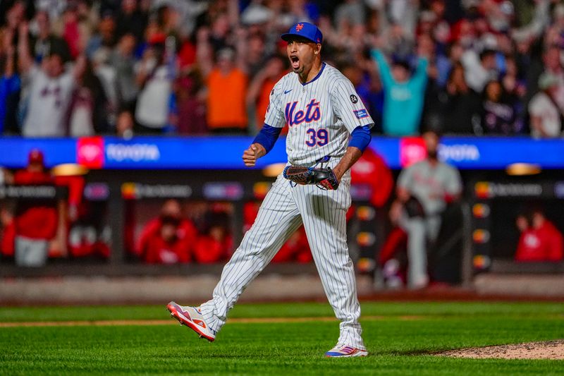 Sep 22, 2024; New York City, New York, USA;  New York Mets pitcher Edwin Diaz (39) reacts to getting the final out of the game against the Philadelphia Phillies at Citi Field. Mandatory Credit: Gregory Fisher-Imagn Images