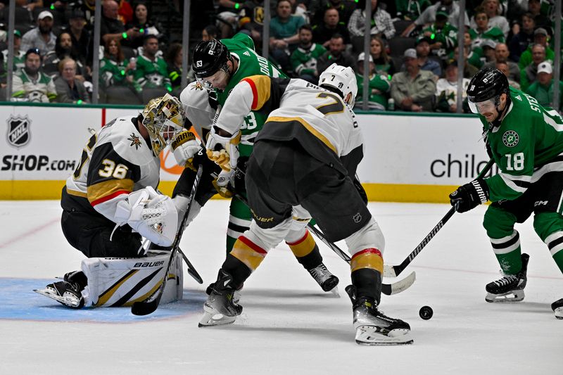 Apr 24, 2024; Dallas, Texas, USA; Vegas Golden Knights goaltender Logan Thompson (36) faces a shot from Dallas Stars right wing Evgenii Dadonov (63) and center Sam Steel (18) during the second period in game two of the first round of the 2024 Stanley Cup Playoffs at American Airlines Center. Mandatory Credit: Jerome Miron-USA TODAY Sports