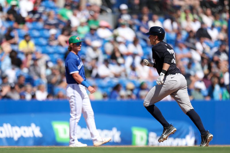 Mar 17, 2025; Dunedin, Florida, USA; New York Yankees catcher Ben Rice (93) runs the bases after hitting a home run against the Toronto Blue Jays in the seventh inning during spring training at TD Ballpark. Mandatory Credit: Nathan Ray Seebeck-Imagn Images