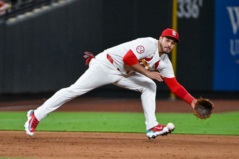 May 20, 2024; St. Louis, Missouri, USA;  St. Louis Cardinals third baseman Nolan Arenado (28) fields a ground ball against the Baltimore Orioles during the ninth inning at Busch Stadium. Mandatory Credit: Jeff Curry-USA TODAY Sports