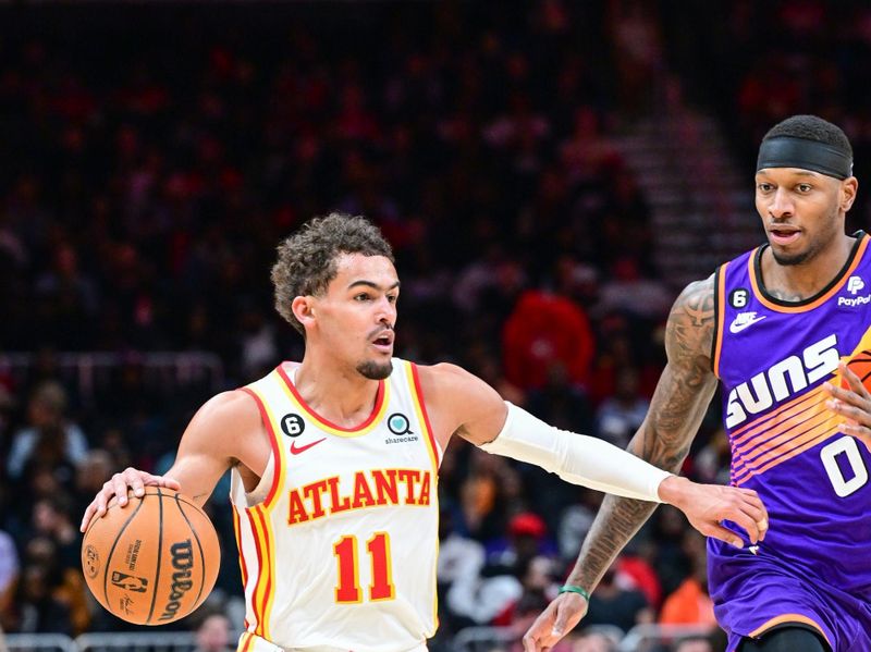 ATLANTA, GA - FEBUARY 9: Trae Young #11 of the Atlanta Hawks goes to the basket during the game  on Febuary 9, 2023 at State Farm Arena in Atlanta, Georgia.  NOTE TO USER: User expressly acknowledges and agrees that, by downloading and/or using this Photograph, user is consenting to the terms and conditions of the Getty Images License Agreement. Mandatory Copyright Notice: Copyright 2023 NBAE (Photo by Adam Hagy/NBAE via Getty Images)