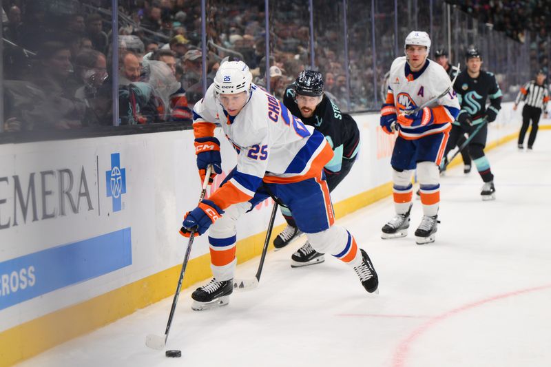 Nov 16, 2024; Seattle, Washington, USA; New York Islanders defenseman Dennis Cholowski (25) advances the puck against the Seattle Kraken during the third period at Climate Pledge Arena. Mandatory Credit: Steven Bisig-Imagn Images