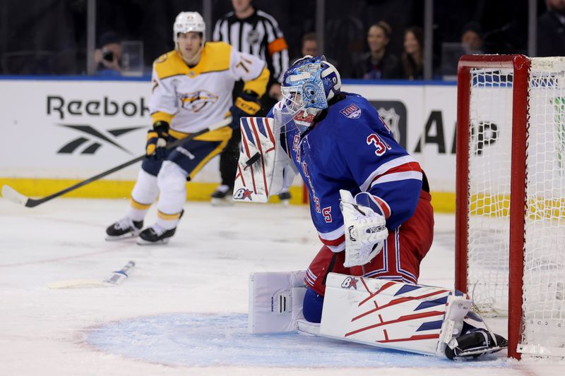 Nov 10, 2025; New York, New York, USA; New York Rangers goaltender Igor Shesterkin (31) makes a save against the Nashville Predators after losing his stick during the third period at Madison Square Garden. Mandatory Credit: Brad Penner-Imagn Images