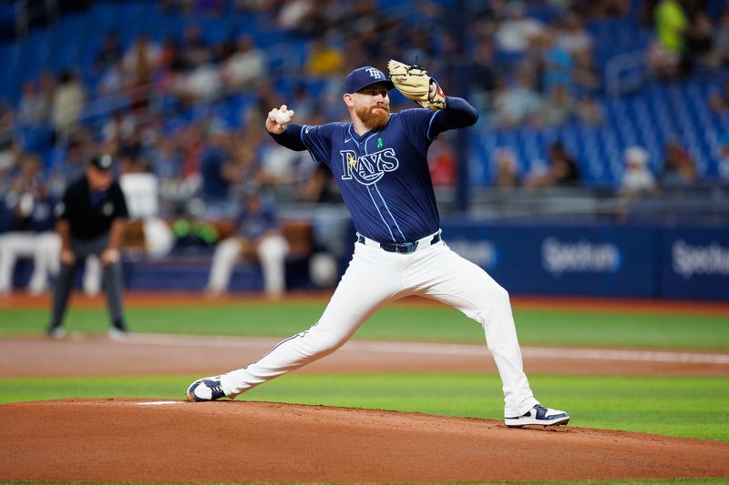 May 28, 2024; St. Petersburg, Florida, USA;  Tampa Bay Rays pitcher Zack Littell (52) throws a pitch against the Oakland Athletics in the first inning at Tropicana Field. Mandatory Credit: Nathan Ray Seebeck-USA TODAY Sports