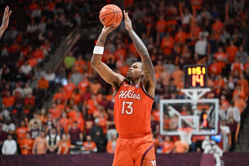 Feb 21, 2026; Blacksburg, Virginia, USA;  Virginia Tech Hokies forward Amani Hansberry (13) shoots a shot against the Wake Forest Demon Deacons during the second half at Cassell Coliseum. Mandatory Credit: Brian Bishop-Imagn Images