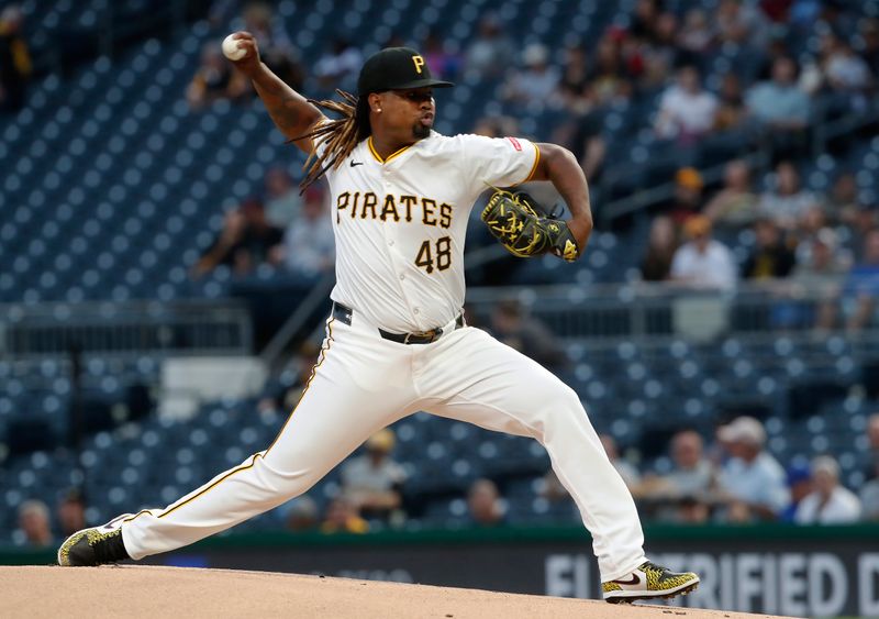 Sep 25, 2024; Pittsburgh, Pennsylvania, USA;  Pittsburgh Pirates starting pitcher Luis L. Ortiz (48) delivers a pitch against the Milwaukee Brewers during the first inning at PNC Park. Mandatory Credit: Charles LeClaire-Imagn Images