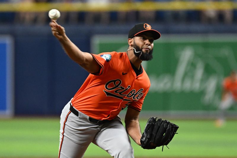 Aug 10, 2024; St. Petersburg, Florida, USA; Baltimore Orioles relief pitcher Sereanthony Dominguez (56) throws a pitch in the ninth inning against the Tampa Bay Rays at Tropicana Field. Mandatory Credit: Jonathan Dyer-USA TODAY Sports