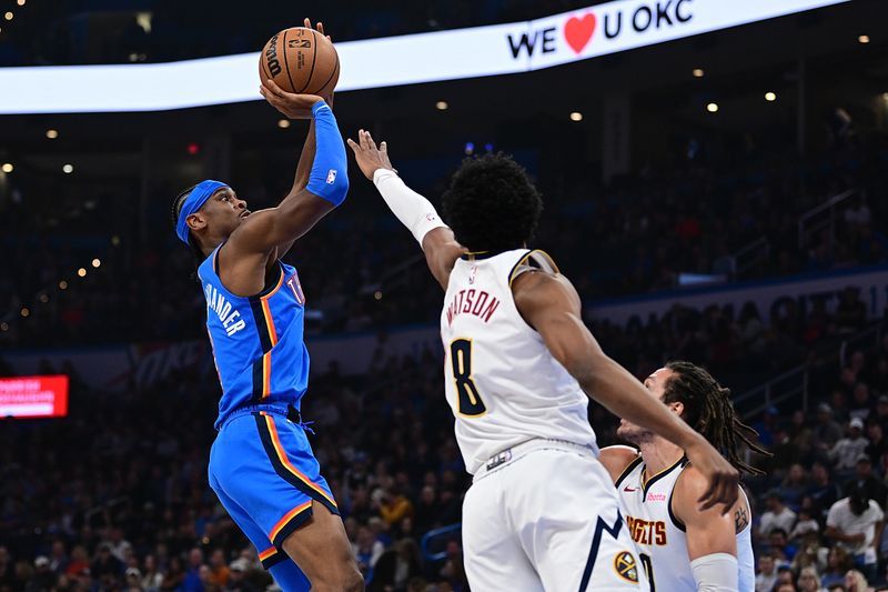 OKLAHOMA CITY, OKLAHOMA - JANUARY 31: Shai Gilgeous-Alexander #2 of the Oklahoma City Thunder goes up for a shot against Peyton Watson #8 of the Denver Nuggets during the first half at Paycom Center on January 31, 2024 in Oklahoma City, Oklahoma. NOTE TO USER: User expressly acknowledges and agrees that, by downloading and or using this Photograph, user is consenting to the terms and conditions of the Getty Images License Agreement. (Photo by Joshua Gateley/Getty Images)