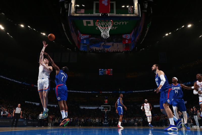 OKLAHOMA CITY, OK - FEBRUARY 22: Josh Giddey #3 of the Oklahoma City Thunder drives to the basket during the game against the LA Clippers on February 22SF, 2024 at Paycom Arena in Oklahoma City, Oklahoma. NOTE TO USER: User expressly acknowledges and agrees that, by downloading and or using this photograph, User is consenting to the terms and conditions of the Getty Images License Agreement. Mandatory Copyright Notice: Copyright 2024 NBAE (Photo by Zach Beeker/NBAE via Getty Images)