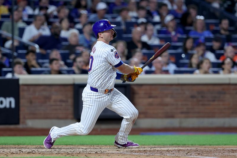 Aug 13, 2024; New York City, New York, USA; New York Mets first baseman Pete Alonso (20) follows through on a two run single against the Oakland Athletics during the fifth inning at Citi Field. Mandatory Credit: Brad Penner-USA TODAY Sports