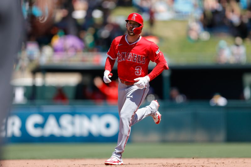 May 22, 2025; West Sacramento, California, USA; Los Angeles Angels left fielder Taylor Ward (3) rounds the bases after hitting a grand slam during the seventh inning against the Athletics at Sutter Health Park. Mandatory Credit: Sergio Estrada-Imagn Images
