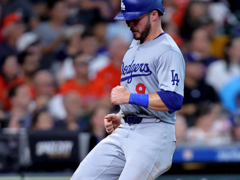 Jul 28, 2024; Houston, Texas, USA; Los Angeles Dodgers second baseman Gavin Lux (9) crosses home plate to score a run against the Houston Astros during the eighth inning at Minute Maid Park. Mandatory Credit: Erik Williams-USA TODAY Sports