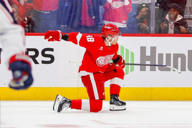 Mar 19, 2024; Detroit, Michigan, USA; Detroit Red Wings right wing Patrick Kane (88) celebrates his game winning goal against the Columbus Blue Jackets during an overtime period at Little Caesars Arena. Mandatory Credit: Brian Bradshaw Sevald-USA TODAY Sports