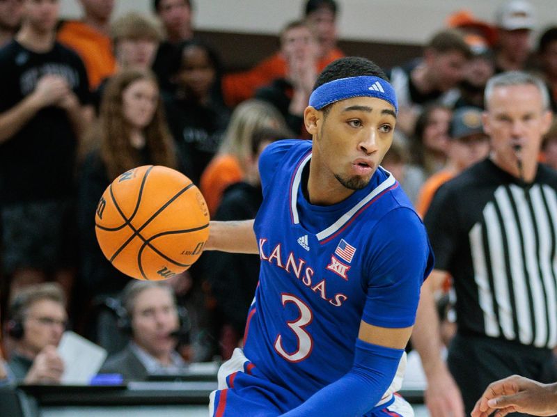 Jan 16, 2024; Stillwater, Oklahoma, USA; Kansas Jayhawks guard Dajuan Harris Jr. (3) drives to the basket during the second half against the Oklahoma State Cowboys at Gallagher-Iba Arena. Mandatory Credit: William Purnell-USA TODAY Sports