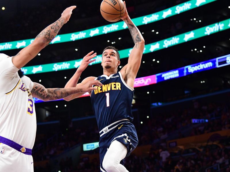 LOS ANGELES, CA - APRIL 27: Michael Porter Jr. #1 of the Denver Nuggets drives to the basket during the game against the Los Angeles Lakers during Round 1 Game 4 of the 2024 NBA Playoffs on April 27, 2024 at Crypto.Com Arena in Los Angeles, California. NOTE TO USER: User expressly acknowledges and agrees that, by downloading and/or using this Photograph, user is consenting to the terms and conditions of the Getty Images License Agreement. Mandatory Copyright Notice: Copyright 2024 NBAE (Photo by Adam Pantozzi/NBAE via Getty Images)