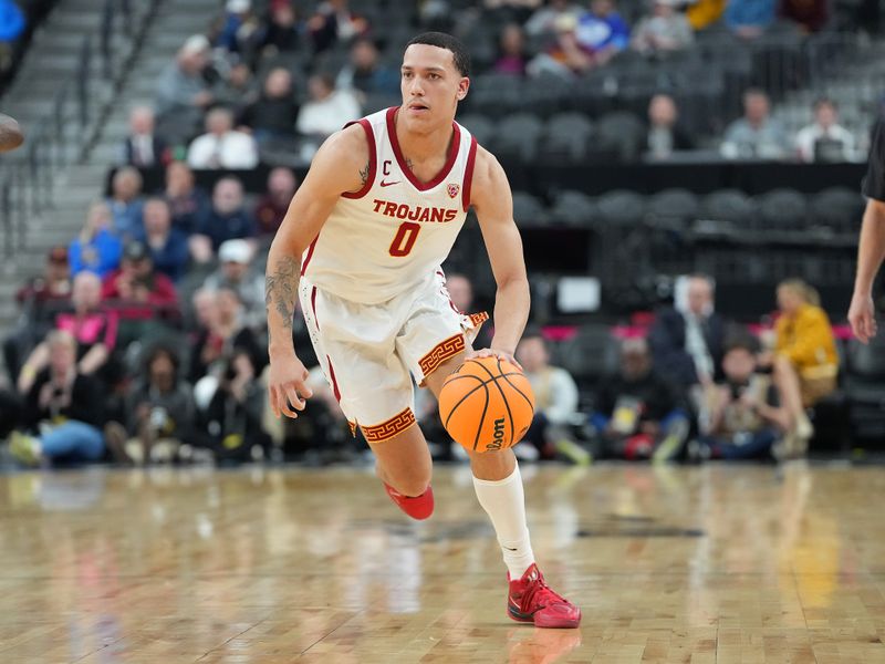 Mar 9, 2023; Las Vegas, NV, USA; USC Trojans forward Kobe Johnson (0) dribbles against the Arizona State Sun Devils during the second half at T-Mobile Arena. Mandatory Credit: Stephen R. Sylvanie-USA TODAY Sports