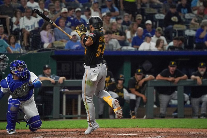 Aug 29, 2023; Kansas City, Missouri, USA; Pittsburgh Pirates right fielder Joshua Palacios (54) loses his bat after a ball hits him in the forehead against the Kansas City Royals in the fifth inning at Kauffman Stadium. Mandatory Credit: Denny Medley-USA TODAY Sports