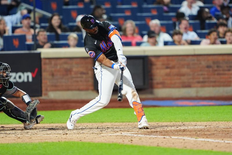 May 31, 2024; New York City, New York, USA; New York Mets right fielder Starling Marte (6) hits an RBI single against the Arizona Diamondbacks during the fourth inning at Citi Field. Mandatory Credit: Gregory Fisher-USA TODAY Sports