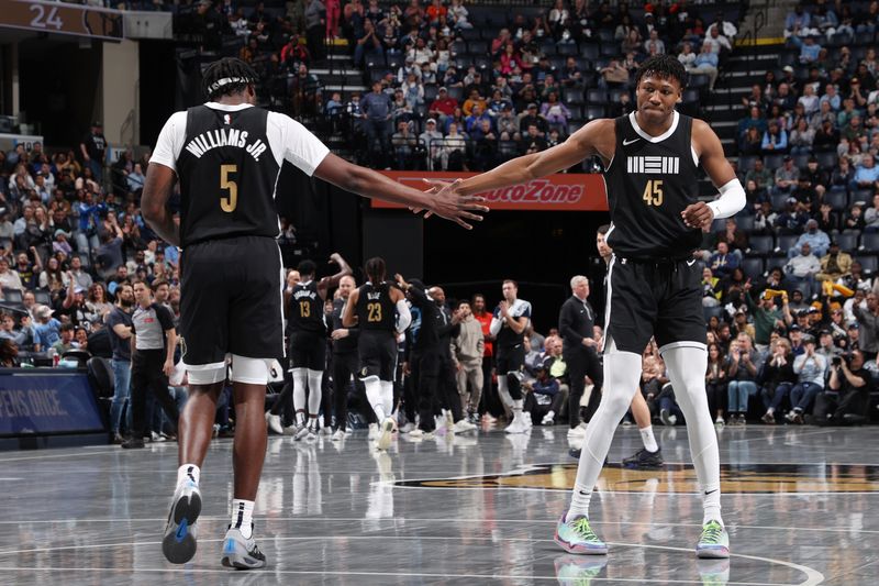 MEMPHIS, TN - FEBRUARY 23: Vince Williams Jr. #5 high fives GG Jackson #45 of the Memphis Grizzlies during the game against the LA Clippers on February 23, 2024 at FedExForum in Memphis, Tennessee. NOTE TO USER: User expressly acknowledges and agrees that, by downloading and or using this photograph, User is consenting to the terms and conditions of the Getty Images License Agreement. Mandatory Copyright Notice: Copyright 2024 NBAE (Photo by Joe Murphy/NBAE via Getty Images)