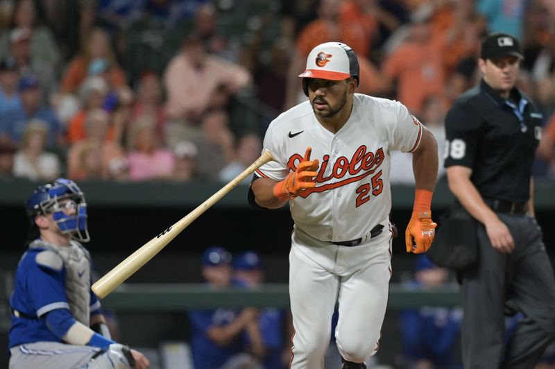 Aug 23, 2023; Baltimore, Maryland, USA;  Baltimore Orioles right fielder Anthony Santander (25) tosses his bat after hitting a eighth inning solo home run against the Toronto Blue Jays at Oriole Park at Camden Yards. Mandatory Credit: Tommy Gilligan-USA TODAY Sports