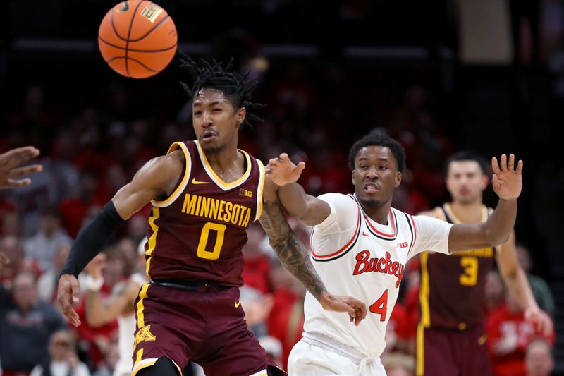 Dec 3, 2023; Columbus, Ohio, USA;  Ohio State Buckeyes guard Dale Bonner (4) goes after the ball as Minnesota Golden Gophers guard Elijah Hawkins (0) defends him on the play during the second half at Value City Arena. Mandatory Credit: Joseph Maiorana-USA TODAY Sports