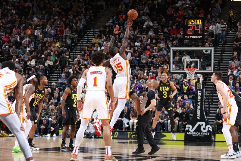 SALT LAKE CITY, UT - MARCH 15:  Opening tip-off between John Collins #20 of the Utah Jazz & Clint Capela #15 of the Atlanta Hawks on March 15, 2024 at Delta Center in Salt Lake City, Utah. NOTE TO USER: User expressly acknowledges and agrees that, by downloading and or using this Photograph, User is consenting to the terms and conditions of the Getty Images License Agreement. Mandatory Copyright Notice: Copyright 2024 NBAE (Photo by Melissa Majchrzak/NBAE via Getty Images)