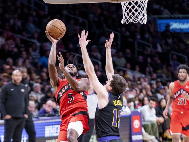 LOS ANGELES, CA - JANUARY 9: Immanuel Quickley #5 of the Toronto Raptors drives to the basket during the game against the Los Angeles Lakers on January 9, 2024 at Crypto.Com Arena in Los Angeles, California. NOTE TO USER: User expressly acknowledges and agrees that, by downloading and/or using this Photograph, user is consenting to the terms and conditions of the Getty Images License Agreement. Mandatory Copyright Notice: Copyright 2024 NBAE (Photo by Tyler Ross/NBAE via Getty Images)