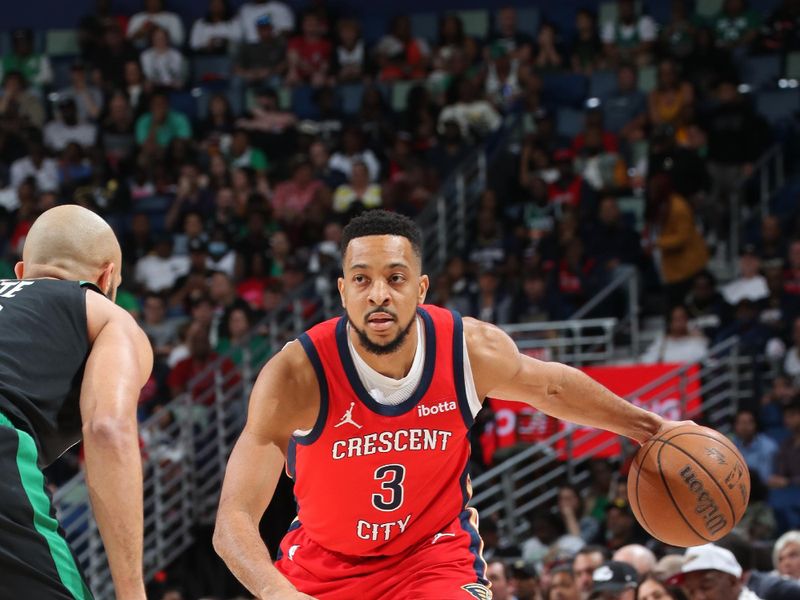 NEW ORLEANS, LA - MARCH 30: CJ McCollum #3 of the New Orleans Pelicans looks on during the game against the Boston Celtics on March 30, 2024 at the Smoothie King Center in New Orleans, Louisiana. NOTE TO USER: User expressly acknowledges and agrees that, by downloading and or using this Photograph, user is consenting to the terms and conditions of the Getty Images License Agreement. Mandatory Copyright Notice: Copyright 2024 NBAE (Photo by Layne Murdoch Jr./NBAE via Getty Images)