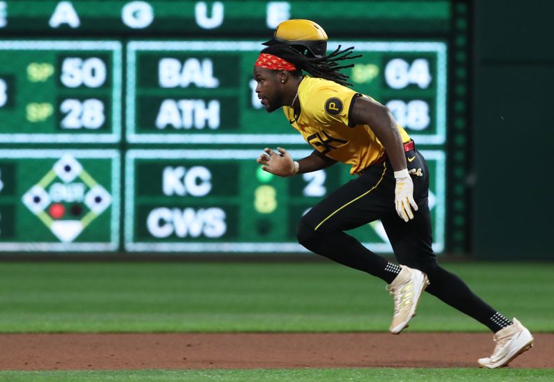 Jun 6, 2025; Pittsburgh, Pennsylvania, USA;  Pittsburgh Pirates center fielder Oneil Cruz (15) runs to second base on a steal attempt against the Philadelphia Phillies during the fifth inning at PNC Park. Mandatory Credit: Charles LeClaire-Imagn Images