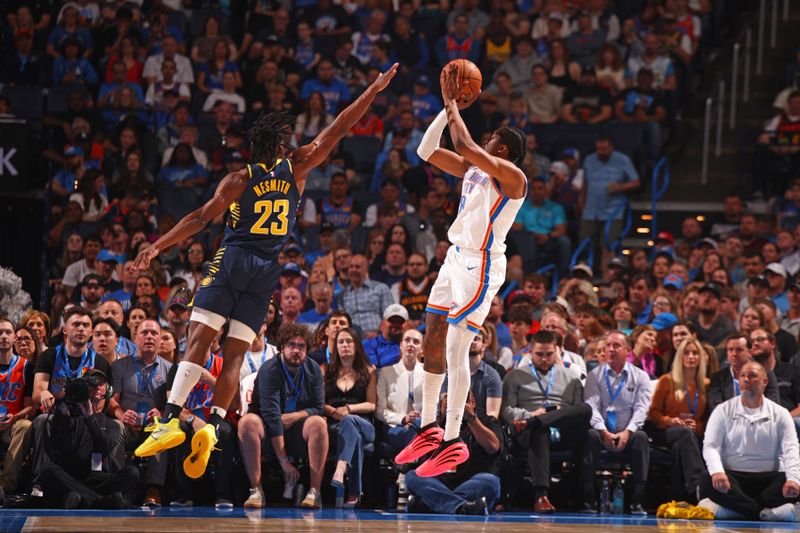 OKLAHOMA CITY, OK - MARCH 29: Aaron Nesmith #23 of the Indiana Pacers plays defense during the game against the Oklahoma City Thunder on March 29, 2025 at Paycom Center in Oklahoma City, Oklahoma. NOTE TO USER: User expressly acknowledges and agrees that, by downloading and or using this photograph, User is consenting to the terms and conditions of the Getty Images License Agreement. Mandatory Copyright Notice: Copyright 2025 NBAE (Photo by Zach Beeker/NBAE via Getty Images)