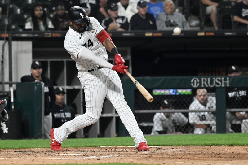 Jul 6, 2023; Chicago, Illinois, USA;  Chicago White Sox designated hitter Eloy Jimenez (74) hits a two run home run against the Toronto Blue Jays during the third inning at Guaranteed Rate Field. Mandatory Credit: Matt Marton-USA TODAY Sports