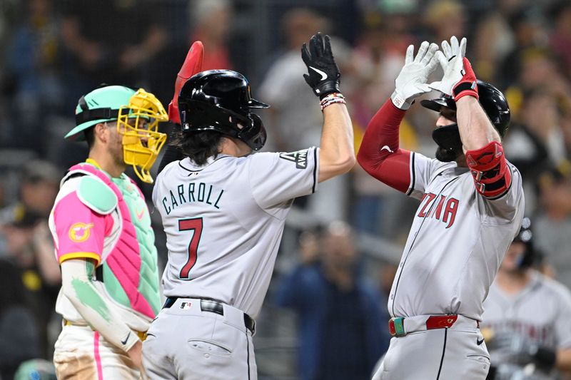 July 5, 2024; San Diego, California, USA; Arizona Diamondbacks right fielder Randal Grichuk (15), right, is congratulated by Corbin Carroll (7) after hitting a two-run home run during the ninth inning against the San Diego Padres at Petco Park. Mandatory Credit: Denis Poroy-USA TODAY Sports