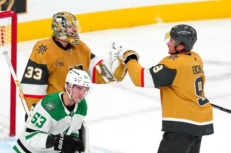 Dec 6, 2024; Las Vegas, Nevada, USA; Vegas Golden Knights center Jack Eichel (9) celebrates with Vegas Golden Knights goaltender Adin Hill (33) after the Golden Knights defeated the Dallas Stars 3-2 at T-Mobile Arena. Mandatory Credit: Stephen R. Sylvanie-Imagn Images