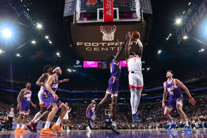 PHOENIX, AZ - MARCH 2: Cam Whitmore #7 of the Houston Rockets drives to the basket during the game against the Phoenix Suns on March 2, 2024 at Footprint Center in Phoenix, Arizona. NOTE TO USER: User expressly acknowledges and agrees that, by downloading and or using this photograph, user is consenting to the terms and conditions of the Getty Images License Agreement. Mandatory Copyright Notice: Copyright 2023 NBAE (Photo by Kate Frese/NBAE via Getty Images)