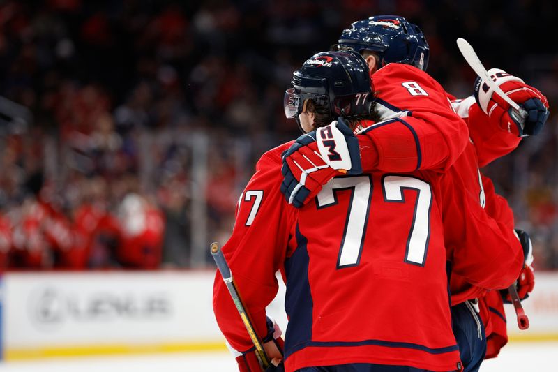 Feb 13, 2024; Washington, District of Columbia, USA; Washington Capitals left wing Alex Ovechkin (8) celebrates with teammates after scoring a goal against the Colorado Avalanche in the third period at Capital One Arena. Mandatory Credit: Geoff Burke-USA TODAY Sports