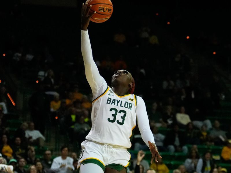 Nov 14, 2023; Waco, Texas, USA; Baylor Lady Bears guard Aijha Blackwell (33) scores a layup against the Utah Utes during the second half at Ferrell Center. Mandatory Credit: Chris Jones-USA TODAY Sports