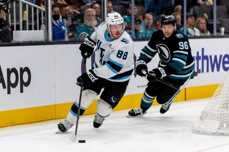 Nov 18, 2025; San Jose, California, USA; Utah Mammoth defenseman Nate Schmidt (88) skates with the puck during the third period against the San Jose Sharks at SAP Center at San Jose. Mandatory Credit: Bob Kupbens-Imagn Images