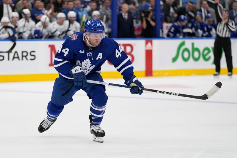 Nov 6, 2023; Toronto, Ontario, CAN; Toronto Maple Leafs defenseman Morgan Rielly (44) skates against the Tampa Bay Lightning during the second period at Scotiabank Arena. Mandatory Credit: John E. Sokolowski-USA TODAY Sports