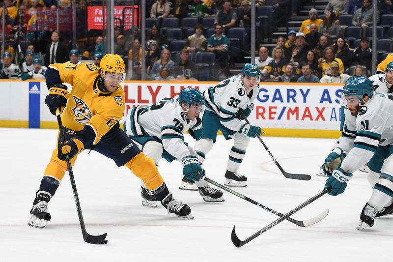 Mar 19, 2024; Nashville, Tennessee, USA; Nashville Predators center Mark Jankowski (17) shoots the puck during the third period against the San Jose Sharks at Bridgestone Arena. Mandatory Credit: Christopher Hanewinckel-USA TODAY Sports