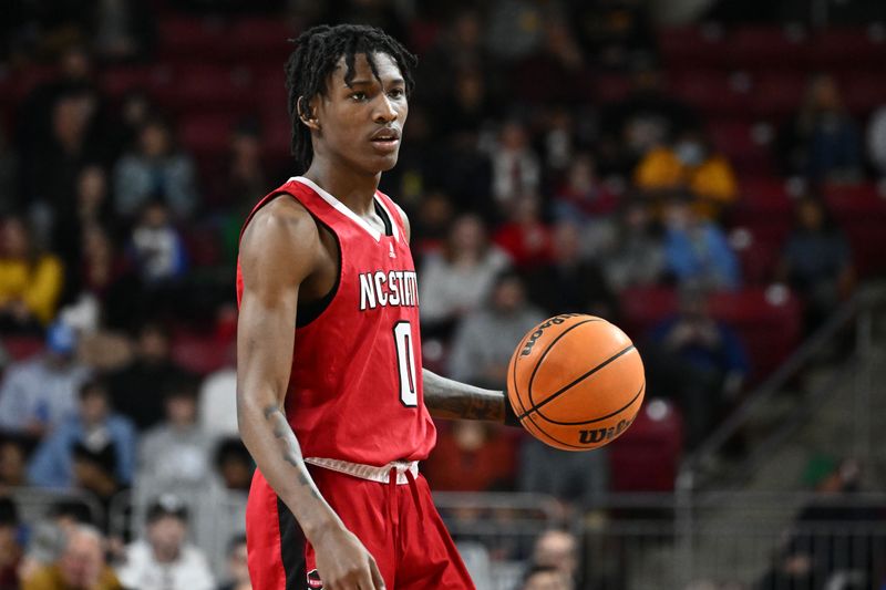 Feb 11, 2023; Chestnut Hill, Massachusetts, USA; North Carolina State Wolfpack guard Terquavion Smith (0) dribbles the ball against the Boston College Eagles during the second half at the Conte Forum. Mandatory Credit: Brian Fluharty-USA TODAY Sports