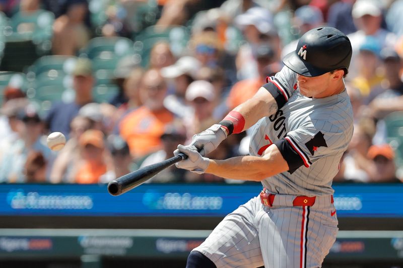 Jul 28, 2024; Detroit, Michigan, USA;  Minnesota Twins right fielder Max Kepler (26) hits a single in the second inning against the Detroit Tigers at Comerica Park. Mandatory Credit: Rick Osentoski-USA TODAY Sports