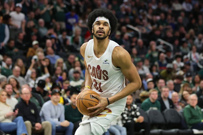 MILWAUKEE, WISCONSIN - JANUARY 26: Jarrett Allen #31 of the Cleveland Cavaliers handles the ball during a game against the Milwaukee Bucks at Fiserv Forum on January 26, 2024 in Milwaukee, Wisconsin. NOTE TO USER: User expressly acknowledges and agrees that, by downloading and or using this photograph, User is consenting to the terms and conditions of the Getty Images License Agreement. (Photo by Stacy Revere/Getty Images)