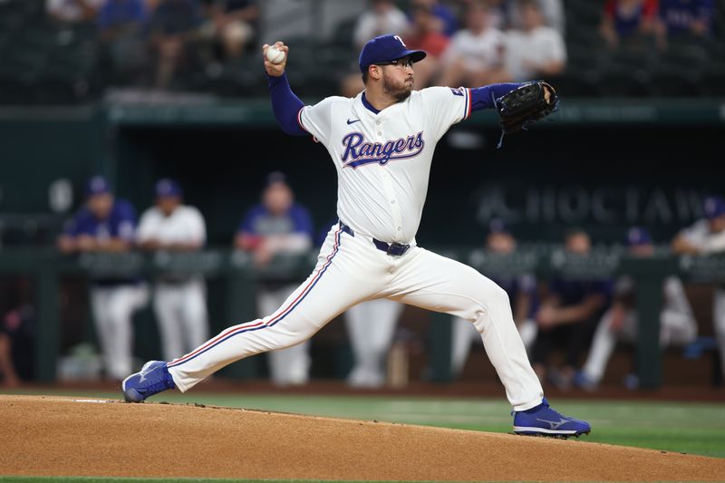 Aug 19, 2024; Arlington, Texas, USA; Texas Rangers pitcher Dane Dunning (33) throws a pitch against the Pittsburgh Pirates in the first inning at Globe Life Field. Mandatory Credit: Tim Heitman-USA TODAY Sports