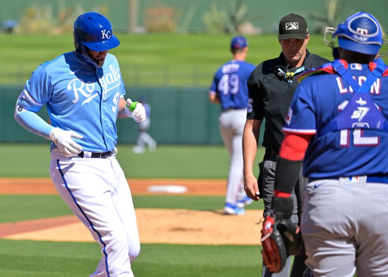 Feb 24, 2023; Surprise, Arizona, USA;  Kansas City Royals first baseman Vinnie Pasquantino (9) crosses the plate after a two run home run in the first inning of a spring training game against the Texas Rangers in Surprise, AZ. Mandatory Credit: Jayne Kamin-Oncea-USA TODAY Sports