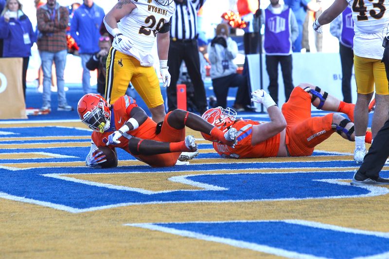 Oct 28, 2023; Boise, Idaho, USA; Boise State Broncos running back Jambres Dubar (1) cores during the first half against the Wyoming Cowboys at Albertsons Stadium. Mandatory Credit: Brian Losness-USA TODAY Sports

