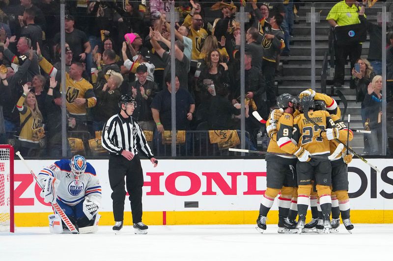 May 8, 2025; Las Vegas, Nevada, USA; Vegas Golden Knights right wing Victor Olofsson (95) celebrates with team mates after scoring a goal against Edmonton Oilers goaltender Calvin Pickard (30) during the first period of game two of the second round of the 2025 Stanley Cup Playoffs at T-Mobile Arena. Mandatory Credit: Stephen R. Sylvanie-Imagn Images
