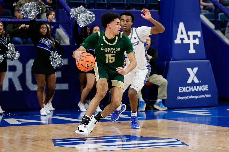 Mar 9, 2024; Colorado Springs, Colorado, USA; Colorado State Rams guard Jalen Lake (15) controls the ball under pressure from Air Force Falcons guard Ethan Taylor (5) in the first half at Clune Arena. Mandatory Credit: Isaiah J. Downing-USA TODAY Sports