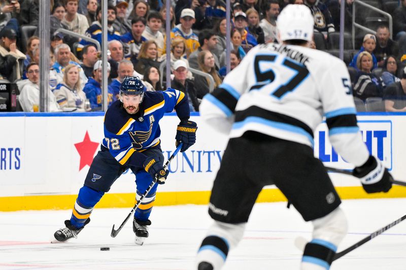 Nov 29, 2025; St. Louis, Missouri, USA; St. Louis Blues defenseman Justin Faulk (72) controls the puck against the Utah Mammoth during the second period at Enterprise Center. Mandatory Credit: Jeff Curry-Imagn Images