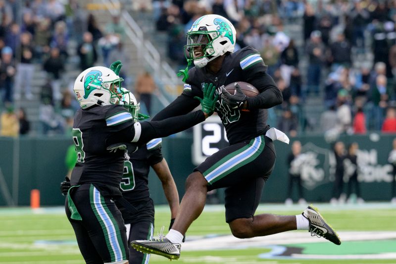 Tulane Green Wave Triumph Over South Alabama Jaguars in a Nail-Biting Finish at Hancock Whitney...